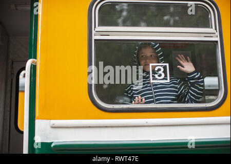 Adorable boy on a train Stock Photo