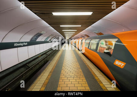 View of platform and train inside station on the Glasgow Subway system in Glasgow, Scotland UK Stock Photo