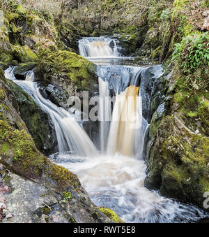 Multiple levels of the Pecca falls on the popular Ingleton waterfall trail in the North Yorkshire Dales England UK. Stock Photo