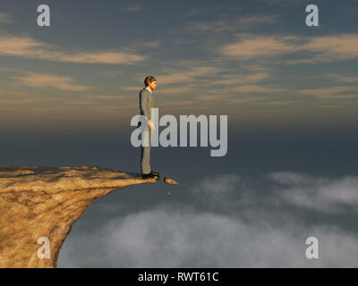 Man on the edge of a cliff Stock Photo
