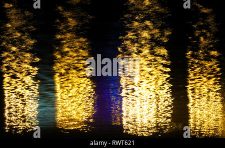 Abstract shapes on water surface, they looks like flames. Stock Photo