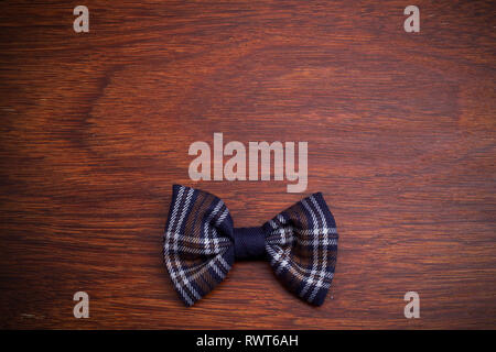 bow tie on dark wooden background. Top view Stock Photo