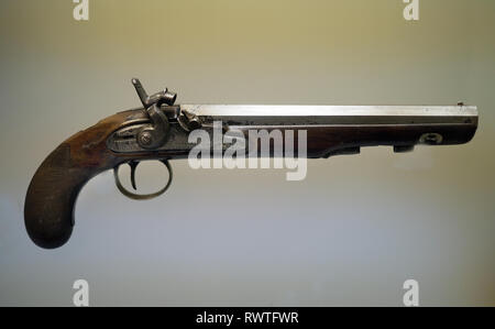 Old muzzle loading cap fired pistols on display. Stock Photo