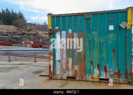 An Old half Container with various paint finishes stored on the quayside of the Batbygg Shipyard on the Island of Maloy in Norway. Stock Photo