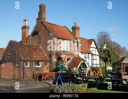Traditional English Village Pub with outside seating Stock Photo