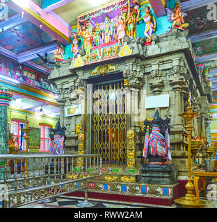 YANGON, MYANMAR - FEBRUARY 15, 2018: The garbha-griha (inner sanctum) of Sri Varatha Raja Perumal Temple, decorated with relief patterns and sculpture Stock Photo