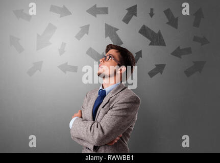 Business person choosing between several directions  Stock Photo