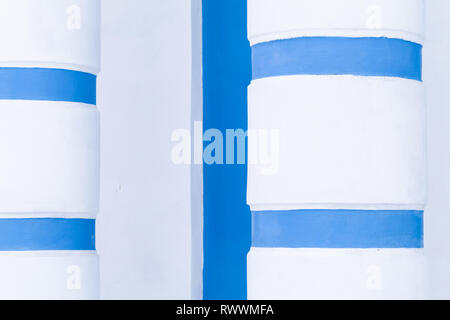 Abstract classic architecture fragment, white columns with blue stripes Stock Photo