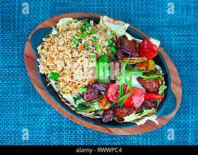 Stir fry beef with mixed vegetables and rice. Top view Stock Photo