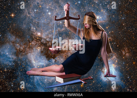 Zodiac sign Libra, presented by a beautiful girl among space galaxies. Intersects with the theme of Themis. Elements of this image furnish by NASA Stock Photo