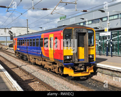 East Midlands Trains Class 153 single unit diesel railcar waits at Peterborough station with a train for Lincoln Stock Photo