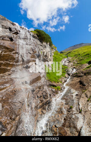 Two small alpine waterfalls on a hot sunny day in Austria Stock Photo