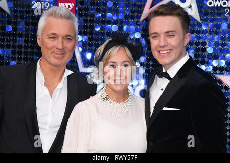 London, UK. 07th Mar, 2019. LONDON, UK. March 07, 2019: Martin & Shirley Kemp with son, Roman arriving for the Global Awards 2019 at the Hammersmith Apollo, London. Picture: Steve Vas/Featureflash Credit: Paul Smith/Alamy Live News Stock Photo