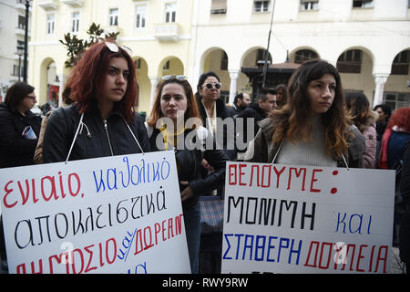 Thessaloniki, Greece. 8th Mar, 2019. Women hold banners during a protest. Due to International Women's Day women of the Hellenic Women Federation demonstrated at the center of the city, demanding equal rights with men in the labor sector and improvement on the working conditions of working mothers. Credit: Giannis Papanikos/ZUMA Wire/Alamy Live News Stock Photo