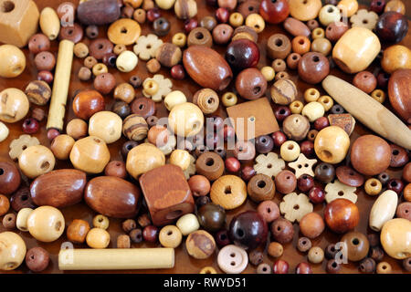 Mixed loose wooden beads for making jewellery Stock Photo