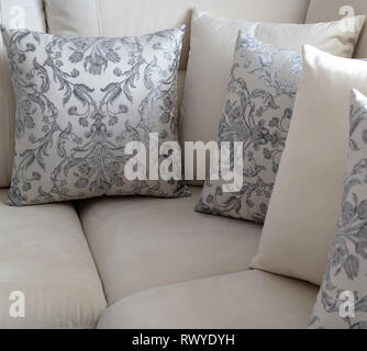 A several pillow on the light sofa Stock Photo