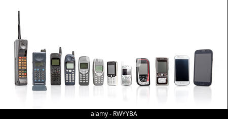 Old Mobile Phone from past to present on white background. Stock Photo