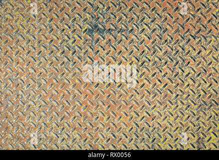 Checkered metal plate painted in colors. Grundy metal texture background Stock Photo