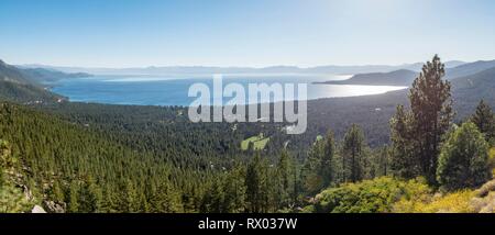 View to Lake Tahoe, surrounded by forest, California, USA Stock Photo