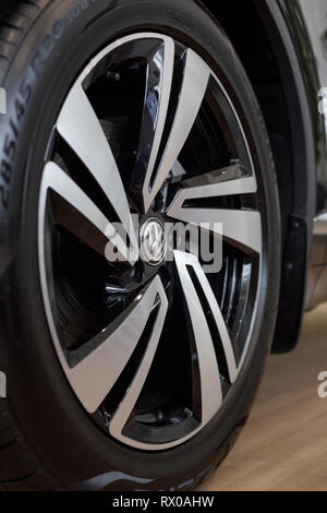 Russia, Izhevsk - February 15, 2019: Showroom Volkswagen. The wheel with alloy wheel of a new Touareg. Famous world brand. Stock Photo