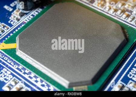 Electronic processor chip on the motherboard. The concept of high technology and repair microchip Stock Photo