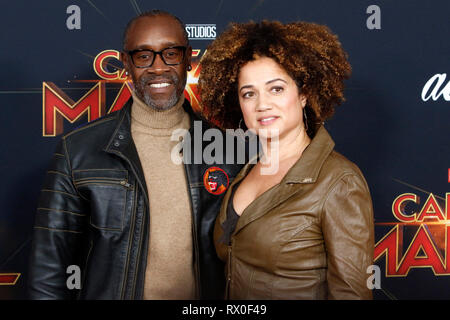 Don Cheadle and Bridgid Coulter attending the 'Captain Marvel' world premiere at El Captian Theatre on March 4,2019 in Los Angeles, California. Stock Photo