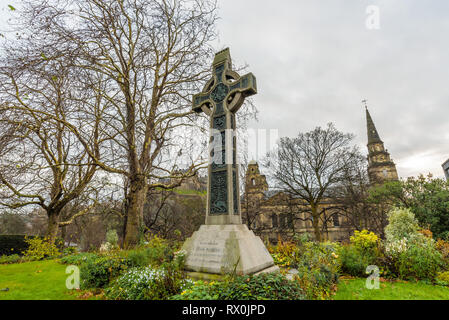 Dean Ramsay Memorial Cross in Princes Street Gardens, Edinburgh, Scotland near The Parish Church of St Cuthbert. Stock Photo