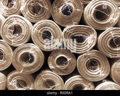 corrugated cardboard for packing. abstract background horizontal lines with wavy lines of beige color Stock Photo