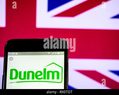 Dunelm Group plc company logo seen displayed on smart phone. Stock Photo