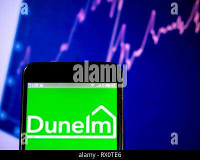 Dunelm Group plc company logo seen displayed on smart phone. Stock Photo