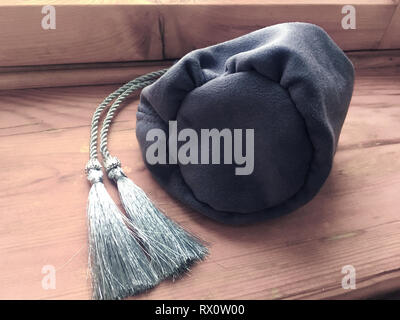 Prediction esoteric witch gray textile bag for tarot and runes Stock Photo