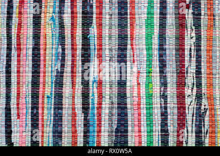 Texture of vintage striped woven carpet. Stock Photo