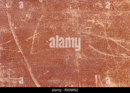 detail of old distressed brown leather background with scrapes Stock Photo