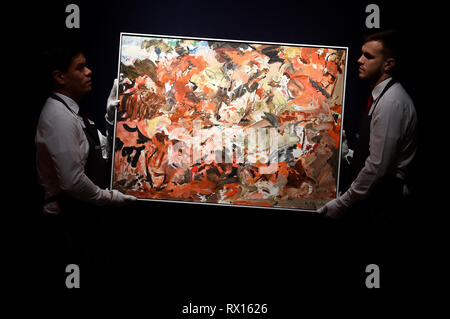Embargoed to 2300 Friday March 8 Art handlers adjust Yet to be titled by Cecily Brown stands behind The Incomplete Truth by Damien Hirst, during a photo call for The George Michael Collection art sale at Christie's, London. Stock Photo