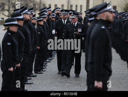 Assistant Chief Constable Bernard Higgins inspects the latest recruits to join Police Scotland during their passing out parade at the Scottish Police College at Tulliallan. Stock Photo