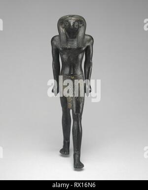 Statuette of Re-Horakhty. Egyptian. Date: 1069 BC-664 BC. Dimensions: 25 × 8.3 × 10.5 cm (9 7/8 × 3 1/4 × 4 1/8 in.). Copper alloy with gilding. Origin: Egypt. Museum: The Chicago Art Institute. Author: Ancient Egyptian. Stock Photo