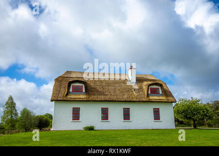 Cottages near Dunguaire Castle, Co Galway, Ireland Stock Photo