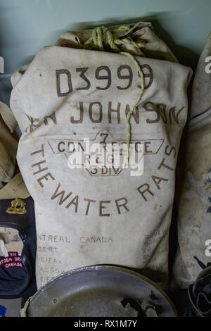 A Canadian Army ( 3rd Canadian Division/The Water Rats) kit bag from World War Two  on display in the Overlord Museum, Colleville-sur-Mer, France. Stock Photo