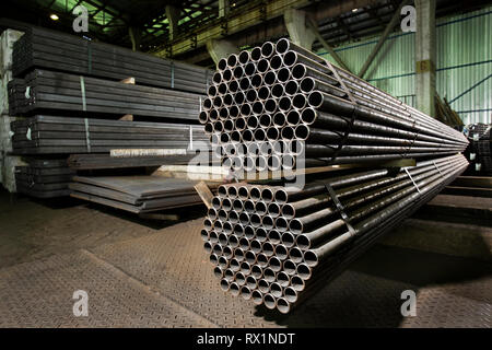 Metal pipes in factory Stock Photo