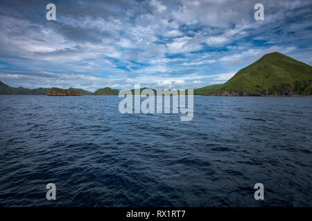 Komodo National Park is located in the center of the Indonesian archipelago, between Sumbawa and Flores islands. It's home of unique Komodo dragon. Stock Photo