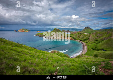 Padar is a small island located between Komodo and Rinca islands within Komodo archipelago. It is the 3rd largest island part of Komodo National Park. Stock Photo