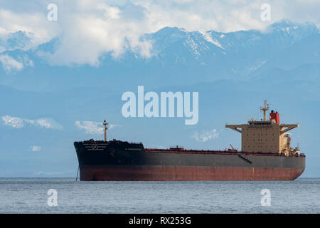 Tanker ship taken in the Straight of Juan de Fuca from Esquimalt Lagoon, Victoria, BC Canada Stock Photo
