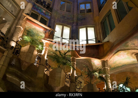 One of the atriums at Casa Mila at night in Barcelona, Spain Stock Photo