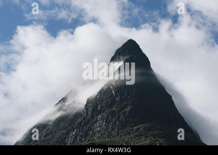 Summit of Mount Innerdalstarnet in the valley of Innerdalen. Tourist attraction of Norway. Scandinavian mountains Stock Photo