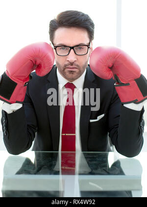 close up.serious businessman Boxing gloves Stock Photo