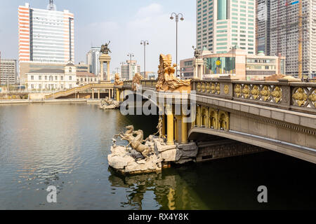 European style bridge crossing the Haihe River in the city center of Tianjin, China Stock Photo