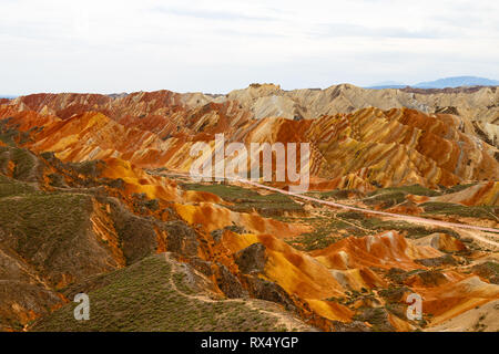 Danxia Feng, or Colored Rainbow Mountains, in Zhangye, Gansu, China. Here the view from the Colorful clouds observation deck Stock Photo