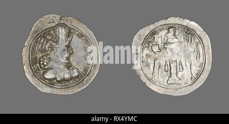 Coin Portraying King Sapor II. Sasanian; Persia. Date: 309 AD-379 AD. Dimensions: Diam. 2.8 cm; 4.20 g. Silver. Origin: Khorasan. Museum: The Chicago Art Institute. Author: Ancient Iranian. Stock Photo