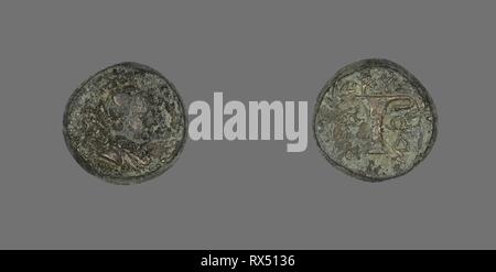 Coin Depicting the Goddess Artemis. Greek. Date: 190 BC. Dimensions: Diam. 1.6 cm; 5.12 g. Bronze. Origin: Ancient Greece. Museum: The Chicago Art Institute. Stock Photo