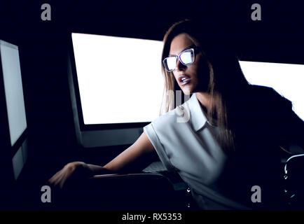 young business woman sitting in computer room. Stock Photo
